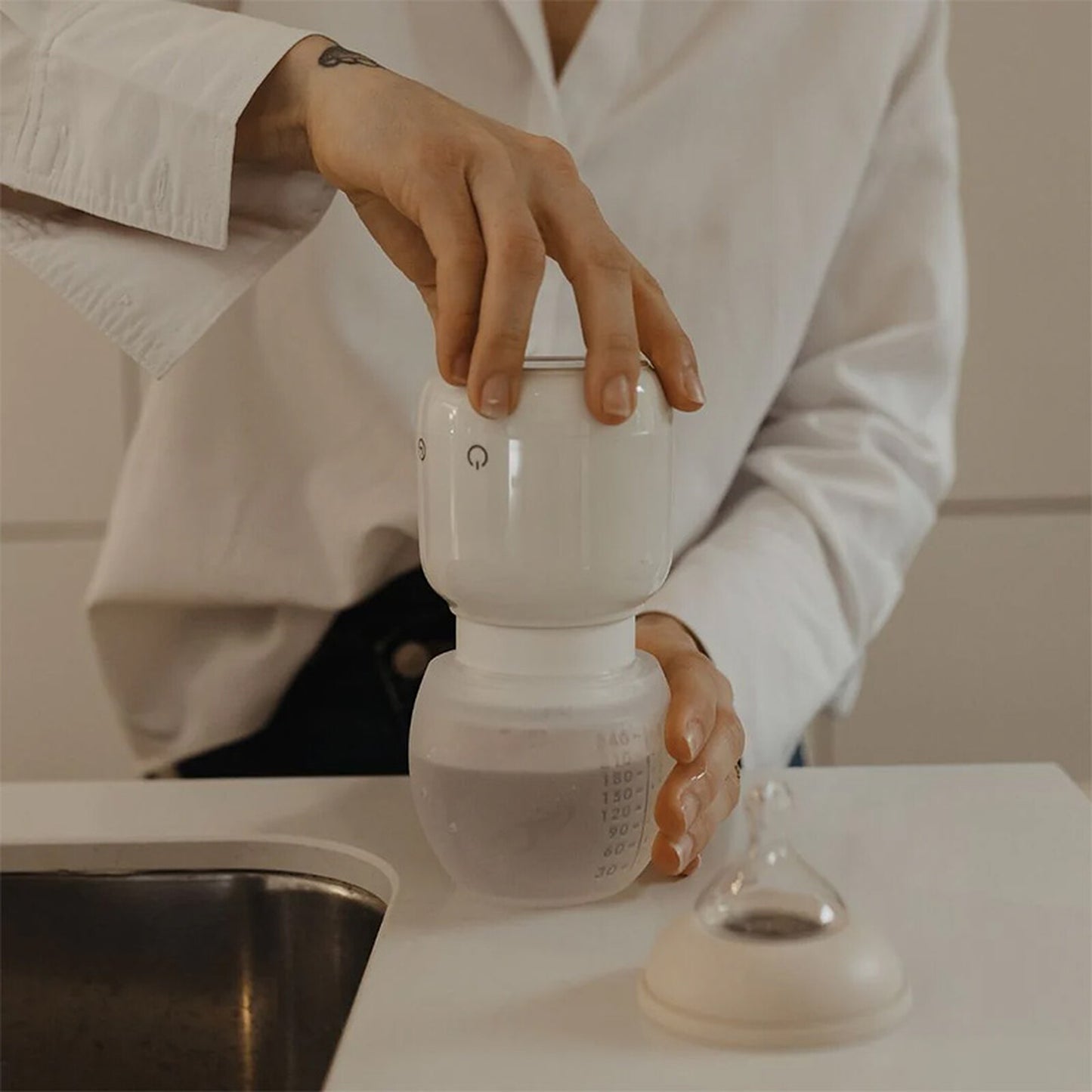 Dimensions compactes du chauffe-biberon TooGo Elhée
