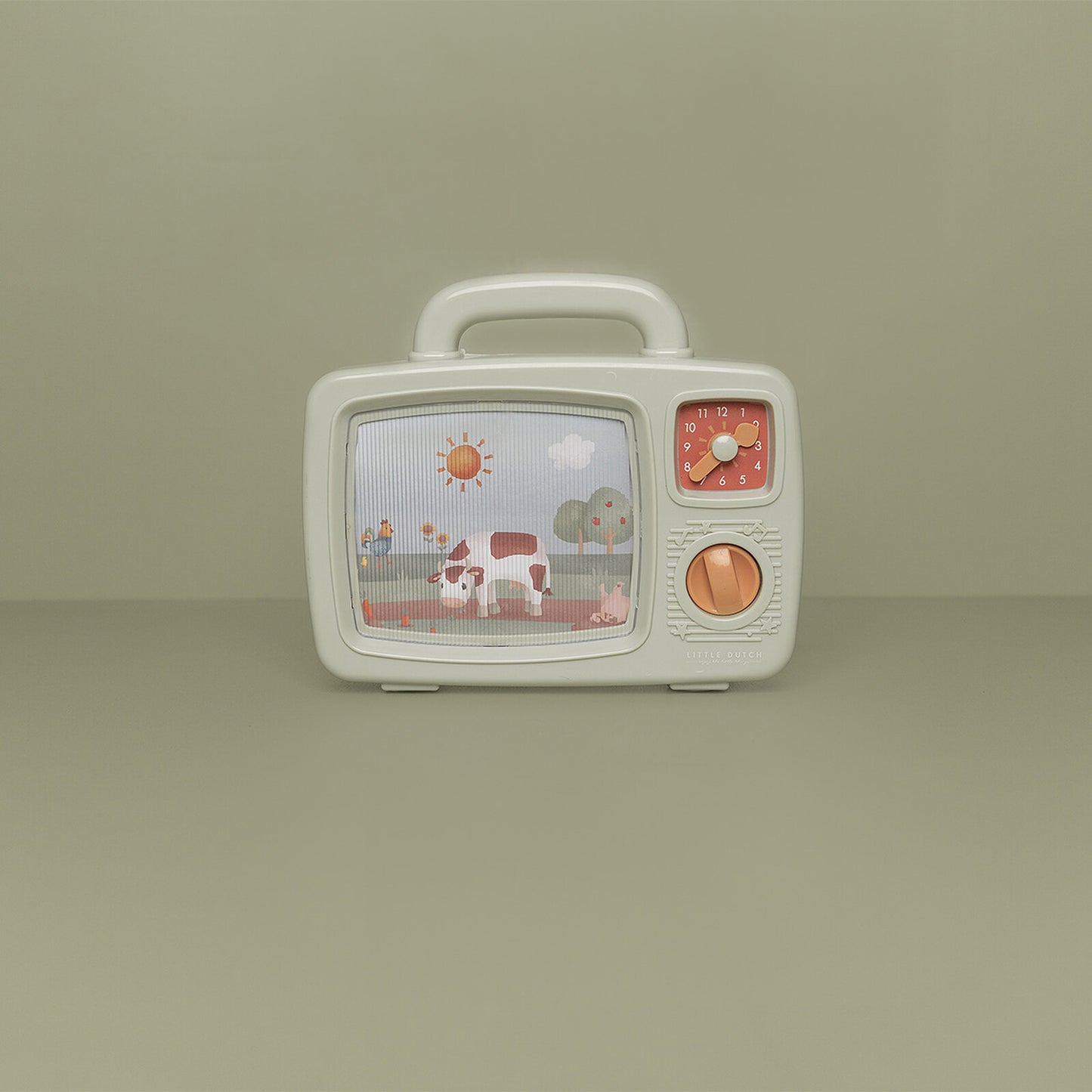 Enfant tournant la manivelle de la télévision musicale Little Dutch