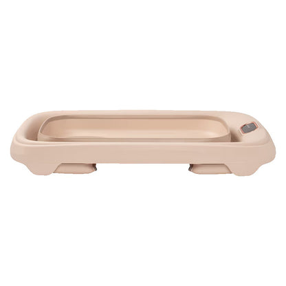 Baignoire Indigo Plus de Maxi-Cosi pliée à plat, vue de dessus, compacte et facile à ranger après utilisation.