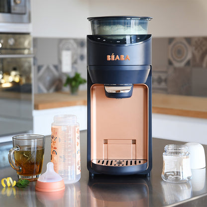 BÉABA Milkéo Plus Night Blue avec sélection de température 22°C, 37°C ou 70°C.