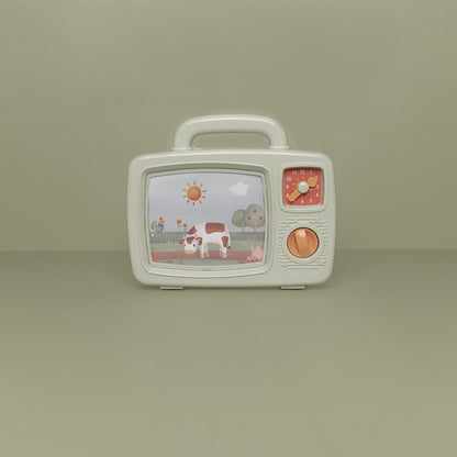Enfant tournant la manivelle de la télévision musicale Little Dutch