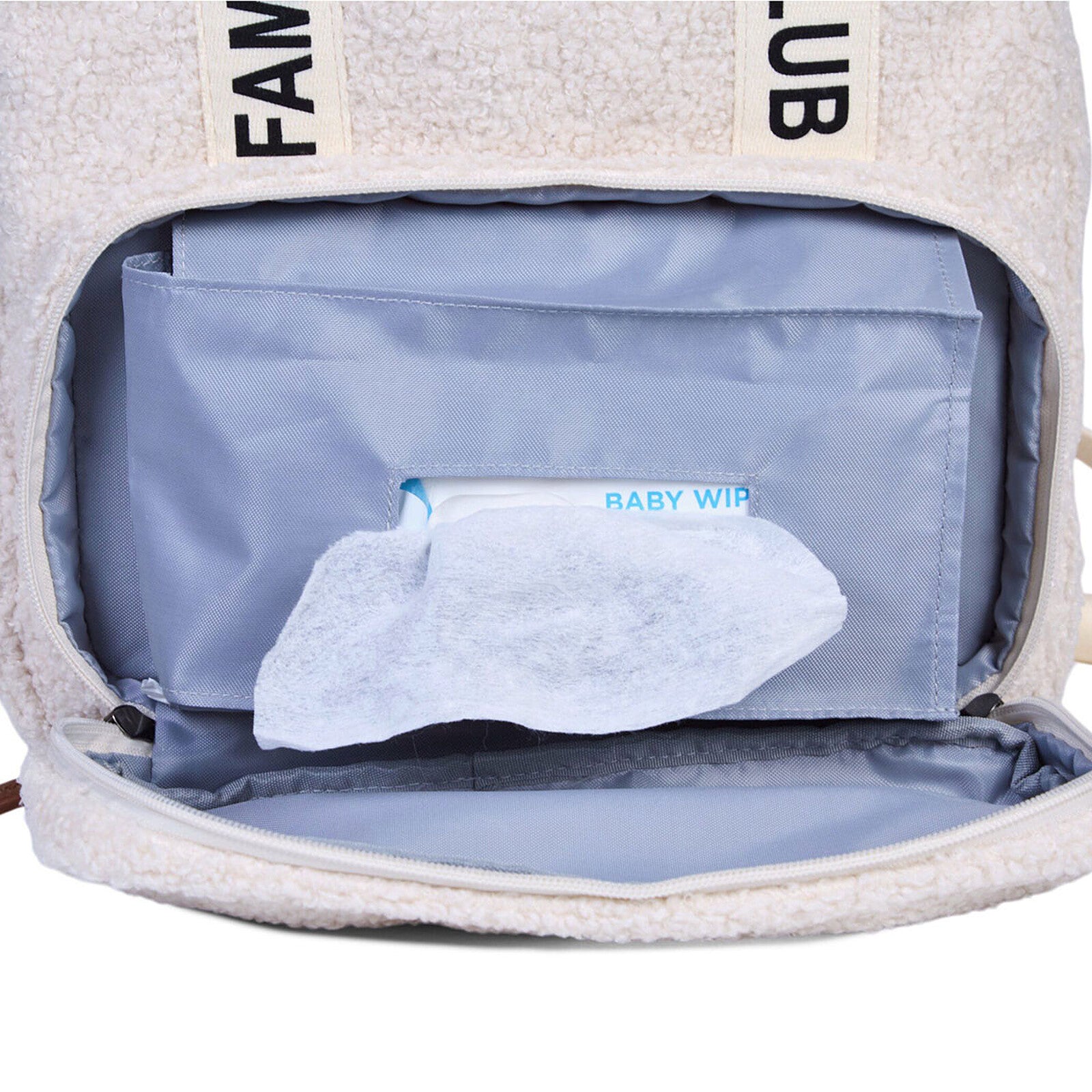 Détail matière teddy écru du sac à langer Childhome