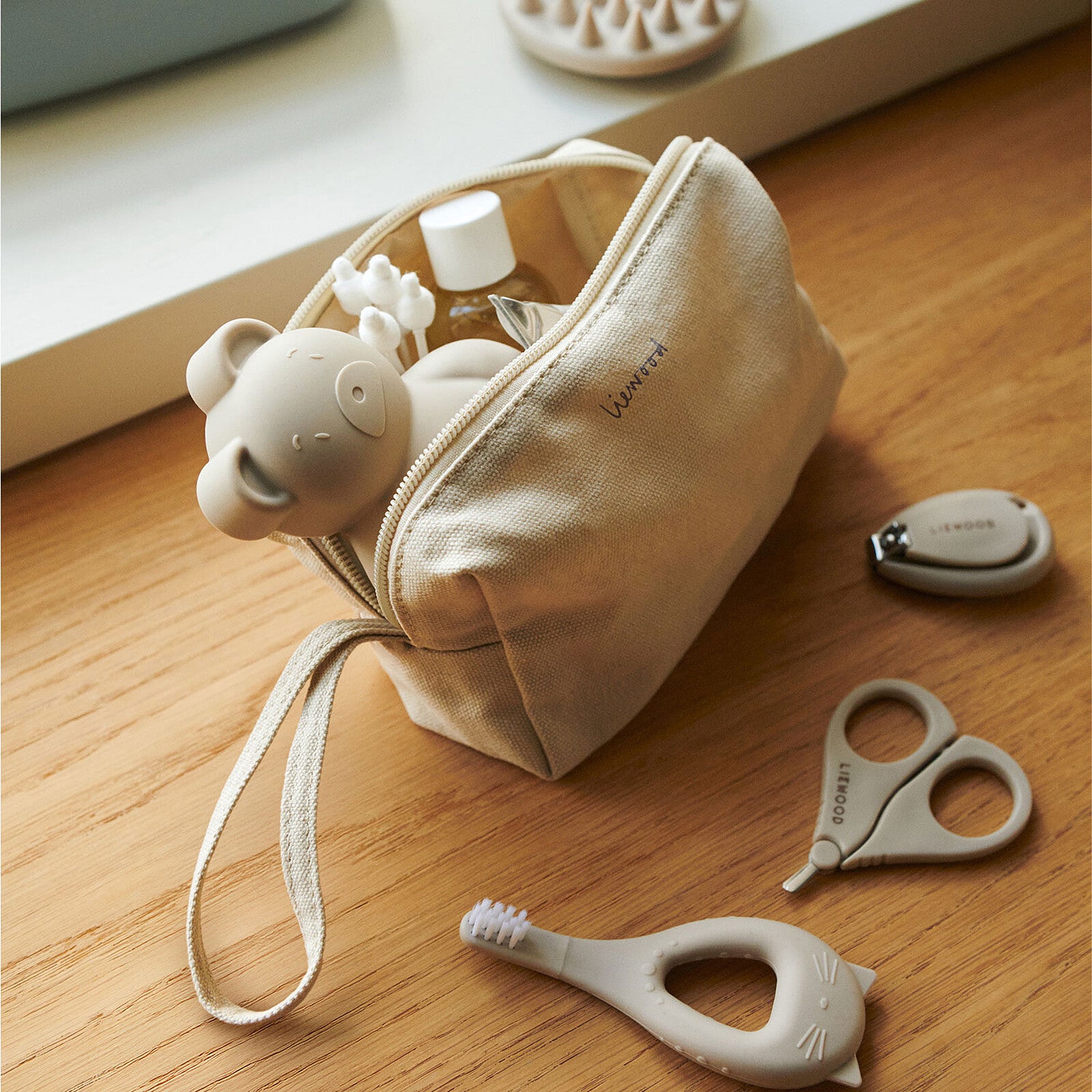 Kit soin bébé Liewood Calista Sandy accessoires dans pochette