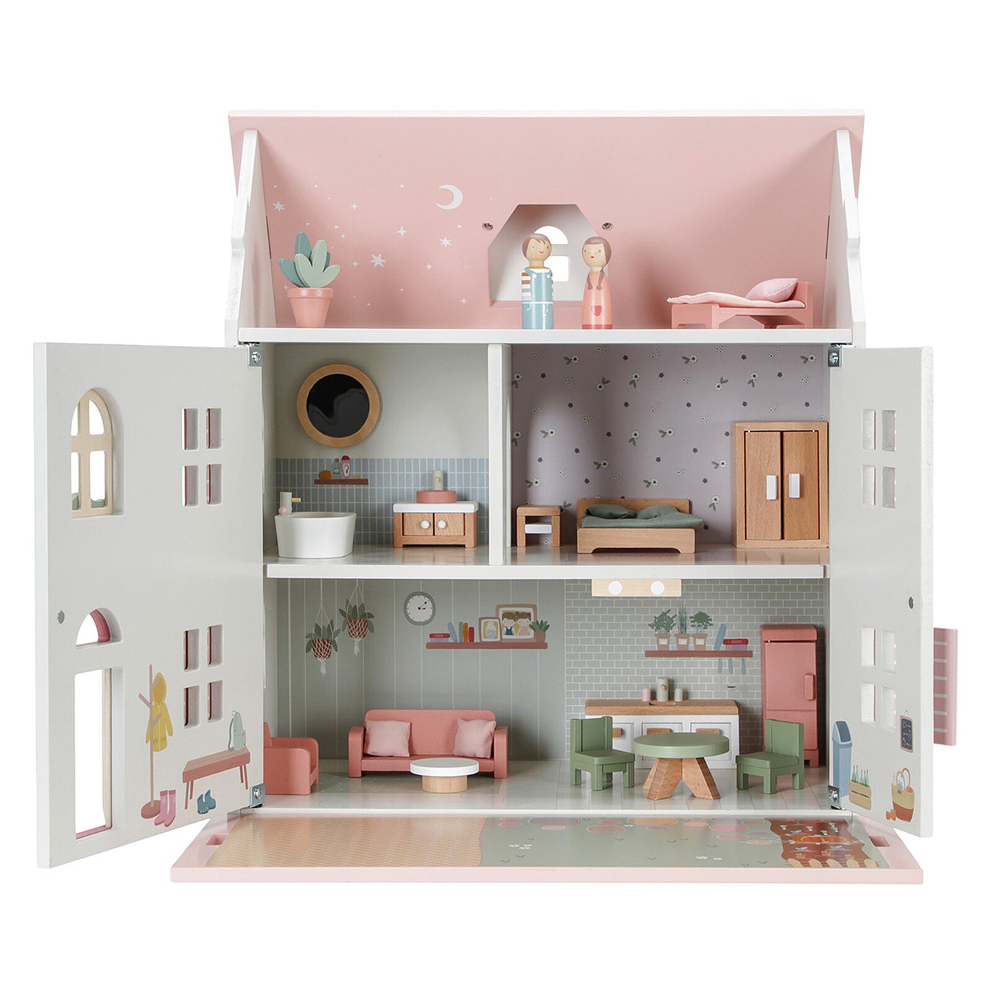 Enfant jouant avec une maison de poupée Little Dutch en bois

