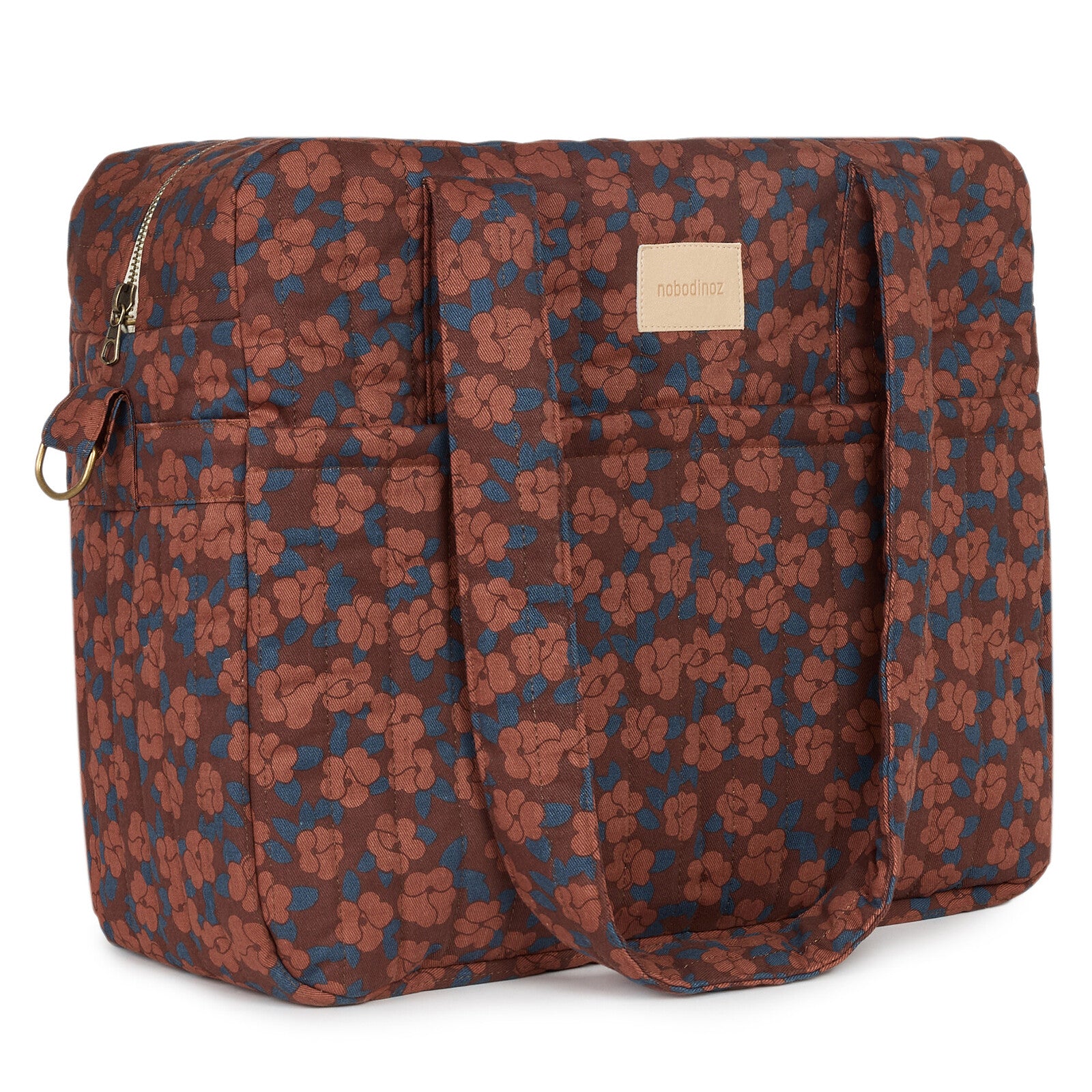 Détail du motif Maroon Poppies sur le sac à langer Nobodinoz Hyde Park