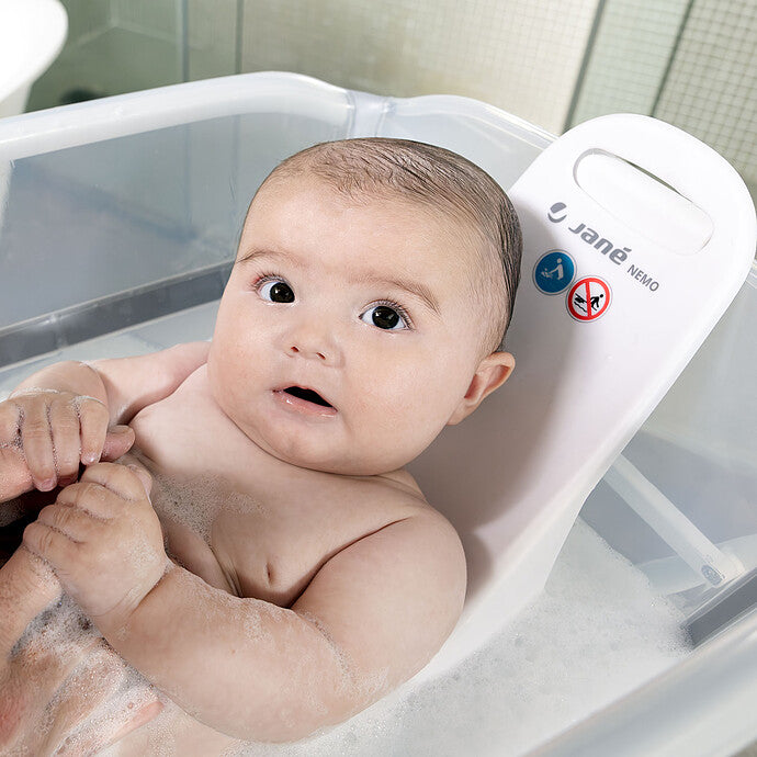 alt="Transat de Bain Nemo Jané avec poignée ergonomique pour transport" 4